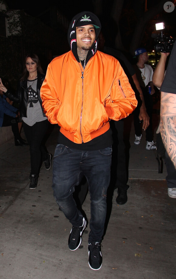 Chris Brown arrive au Hooray Henry's nightclub à West Hollywood, le 19 juin 2015, où la chanteuse Rihanna et Karim Benzema sont égallement arrivés, comme par hasard, séparément. 