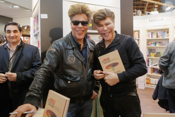 Les jumeaux Grichka et Igor Bogdanoff (Bogdanov) - Salon du livre à la porte de Versailles à Paris le 22 mars 2015