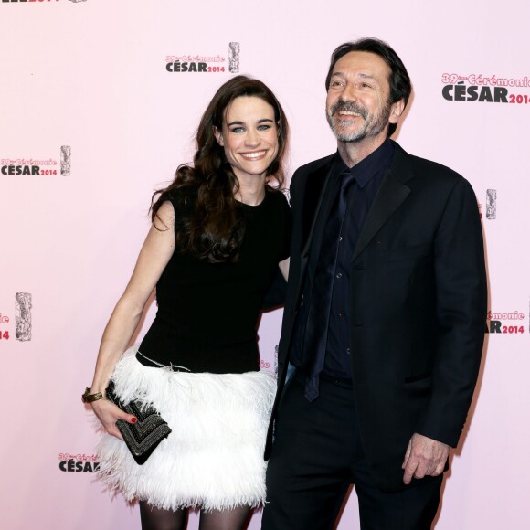 Jean-Hugues Anglade et sa compagne Charlotte Leloup à la cérémonie des César au théâtre du Châtelet à Paris, le 28 Février 2014.