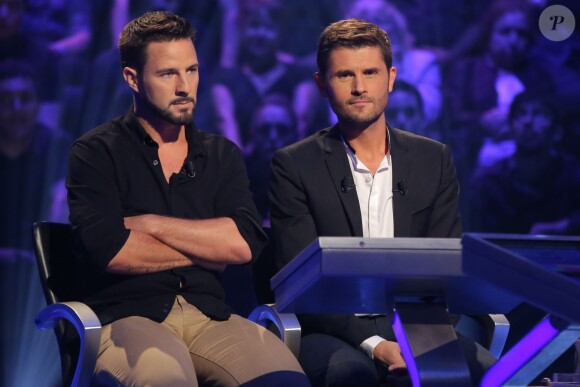 Exclusif - Christophe Beaugrand et Mathieu, gagnant de l'émission QI: la France passe le test, lors du tournage de l'émission spéciale des 15 ans de Qui veut gagner des millions ? (tournage le lundi 31 août 2015, diffusion le samedi 5 septembre 2015 à 20h55 sur TF1).