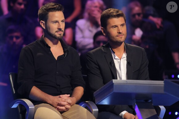 Exclusif - Christophe Beaugrand et Mathieu, gagnant de l'émission "QI: la France passe le test" au profit de l'Association Petits Princes, lors du tournage de l'émission spéciale des 15 ans de Qui veut gagner des millions ? (tournage le lundi 31 août 2015, diffusion le samedi 5 septembre 2015 à 20h55 sur TF1). 