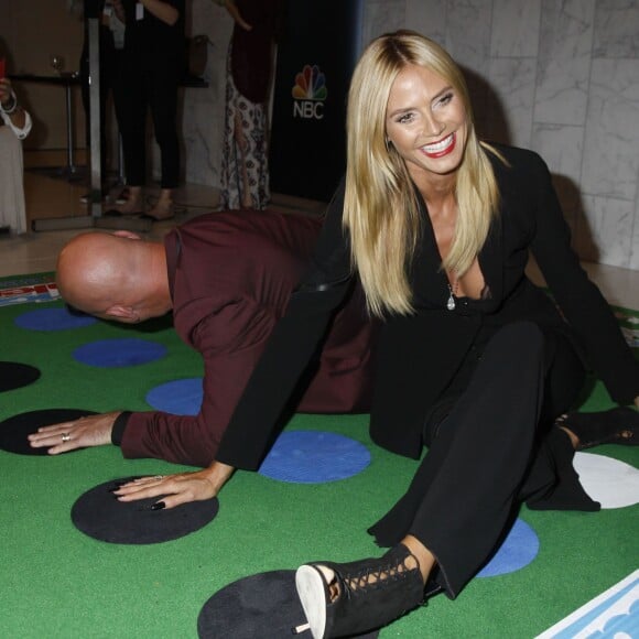 Heidi Klum, Howie Mandel (jeu Twister) - Soirée de l'émission "America's Got Talent" Saison 10 et évènement BBQ à New York, le 2 septembre 2015.