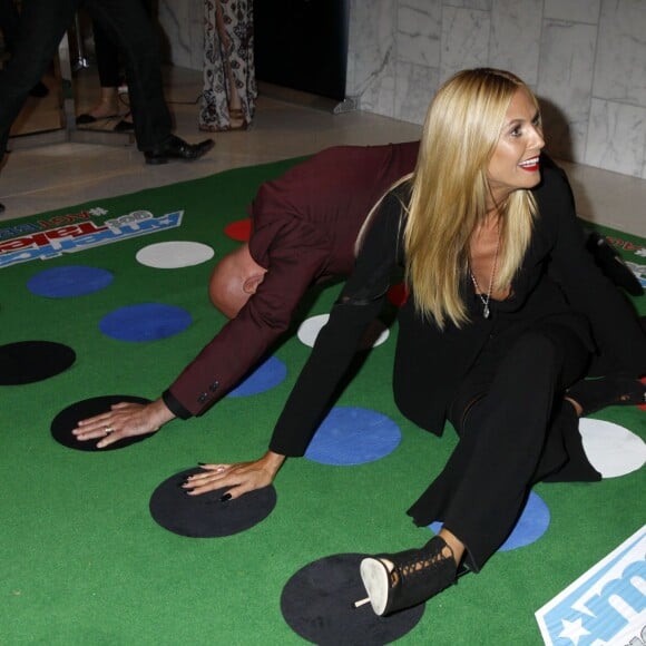 Heidi Klum, Howie Mandel (jeu Twister) - Soirée de l'émission "America's Got Talent" Saison 10 et évènement BBQ à New York, le 2 septembre 2015.