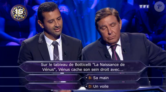 Jaafar Meziane et Jean-Pierre Foucault participent à Qui veut gagner des millions ? sur TF1, le samedi 5 septembre 2015.