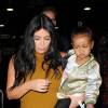 Kim Kardashian, sa fille North West et Simon Huck à New York, le 9 septembre 2015.