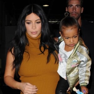 Kim Kardashian, sa fille North West et Simon Huck à New York, le 9 septembre 2015.