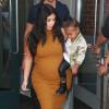 Kim Kardashian, sa fille North West et Simon Huck quittent l'appartement de Kanye West à Soho. New York, le 9 septembre 2015.