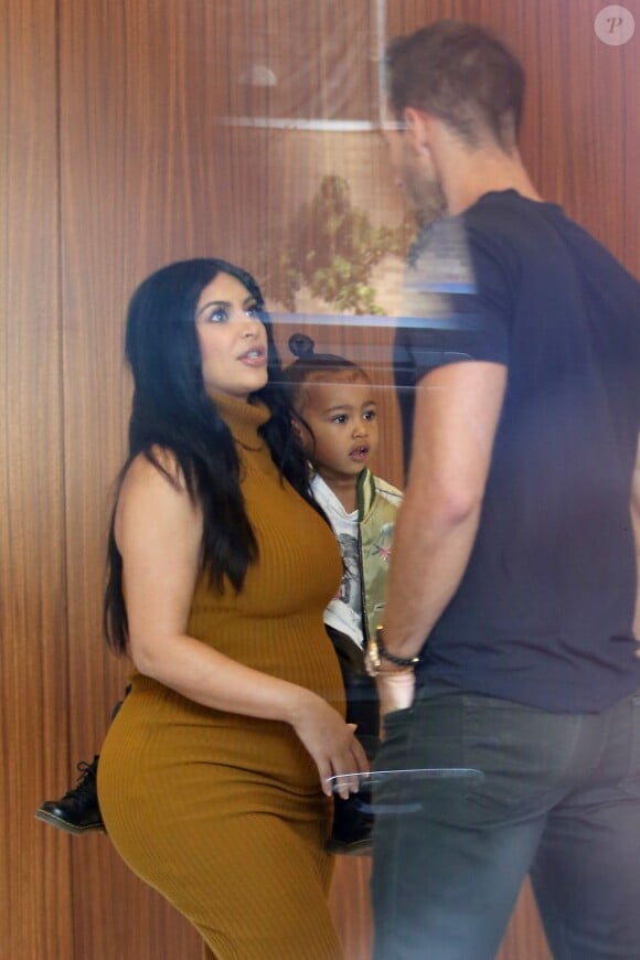 Kim Kardashian, North West et Simon Huck à New York, le 9 septembre 2015.