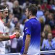 Stan Wawrinka et Roger Federer lors de leur demi-finale de l'US Open à l'USTA Billie Jean King National Tennis Center de Flushing dans le Queens à New York, le 11 septembre 2015
