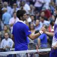 Novak Djokovic et Marin Cilic lors de leur demi-finale de l'US Open à l'USTA Billie Jean King National Tennis Center de Flushing dans le Queens à New York, le 11 septembre 2015