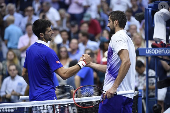 Novak Djokovic et Marin Cilic lors de leur demi-finale de l'US Open à l'USTA Billie Jean King National Tennis Center de Flushing dans le Queens à New York, le 11 septembre 2015
