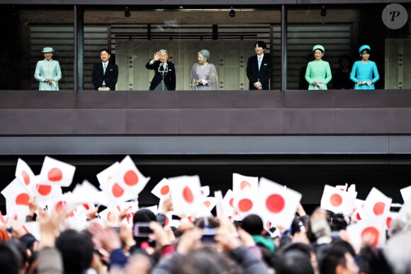 Les 80 ans de l'empereur Akihito du Japon, en décembre 2013 au Japon, en présence des princesses Kiko et Mako (à droite).