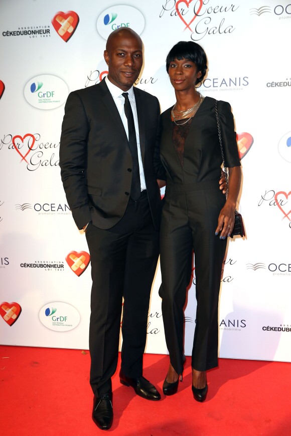Harry Roselmack et sa femme Chrislaine - Personnalités au gala "Par Coeur" pour les 10 ans de l'association "Cekedubonheur" au pavillon d'Armenonville à Paris. Le 24 septembre 2015.