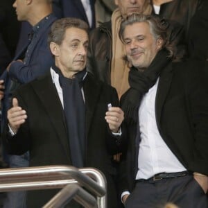 Nicolas Sarkozy et Vincent Labrune au Parc des Princes lors du match entre le Paris Saint-Germain et l'Olympique de Marseille, le 4 octobre 2015