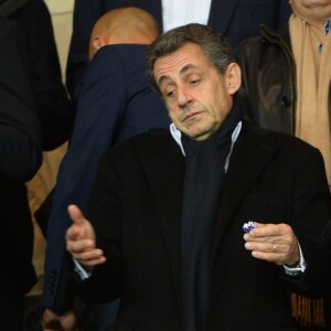 Nicolas Sarkozy et Vincent Labrune au Parc des Princes lors du match entre le Paris Saint-Germain et l'Olympique de Marseille, le 4 octobre 2015