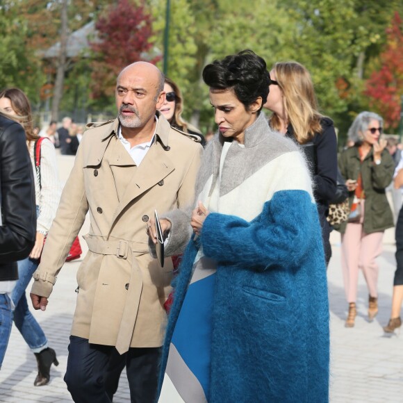 Farida Khelfa and Christian Louboutin arriving for the Louis