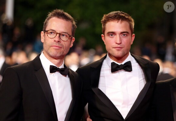 Guy Pearce et Robert Pattinson - Montée des marches du film "The Rover" lors du 67 ème Festival du film de Cannes – Cannes le 18 mai 2014.