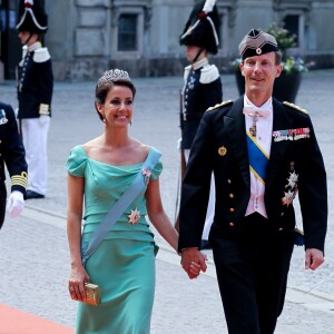 La princesse Marie et le prince Joachim de Danemark au mariage du prince Carl Philip de Suède et Sofia Hellqvist en la chapelle du palais royal à Stockholm le 13 juin 2015