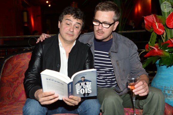 Patrick Pelloux et le dessinateur Charb lors du Lancement du livre de Patrick Pelloux au Buddha-Bar à Paris, le 5 juin 2014