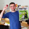 Charb dans les locaux de CVharlie Hebdo à Paris, le 19 septembre 2012