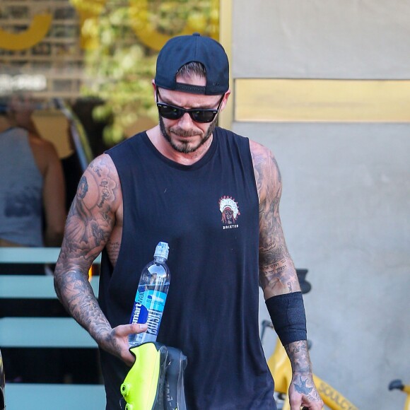 Victoria Beckham et son mari David Beckham sortent de leur séance de gym au Soul Cycle à Los Angeles, le 20 octobre 2015.