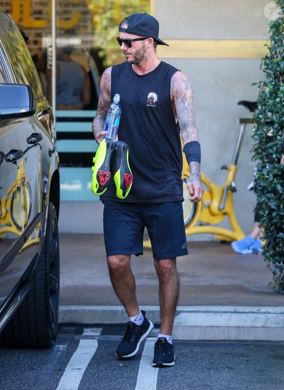 Victoria Beckham et son mari David Beckham sortent de leur séance de gym au Soul Cycle à Los Angeles, le 20 octobre 2015.