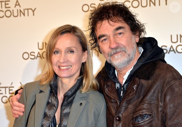 Olivier Marchal et sa femme Catherine - Avant-première du film "Un été à Osage County" à l'UGC Normandie à Paris, le 13 février 2014.