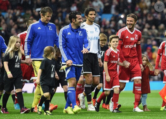 Luis Figo et David Beckham à Old Trafford, à Manchester, le 14 novembre 2015.