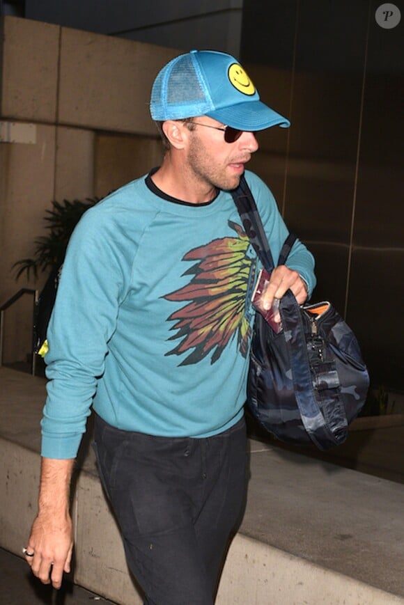 Chris Martin arrive à l'aéroport de LAX à Los Angeles, le 9 novembre 2015