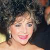 Elizabeth Taylor lors d'une soirée à Paris en faveur de la lutte contre le Sida, en 1985.