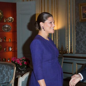 La princesse Victoria de Suède, enceinte, recevait le président afghan Ashraf Ghani, au palais royal de Stockholm, le 4 décembre 2015