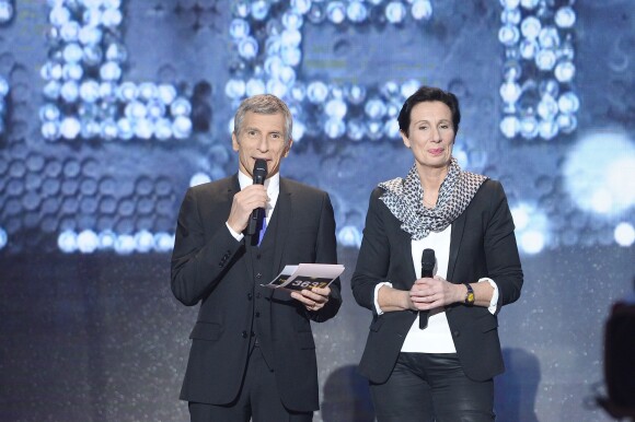 Nagui et Laurence Tiennot-Herment (présidente de l'Association française contre les myopathies), lors du 29e Téléthon 2015, à l'hippodrome de Longchamp, à Paris, le 5 décembre 2015. © Coadic Guirec