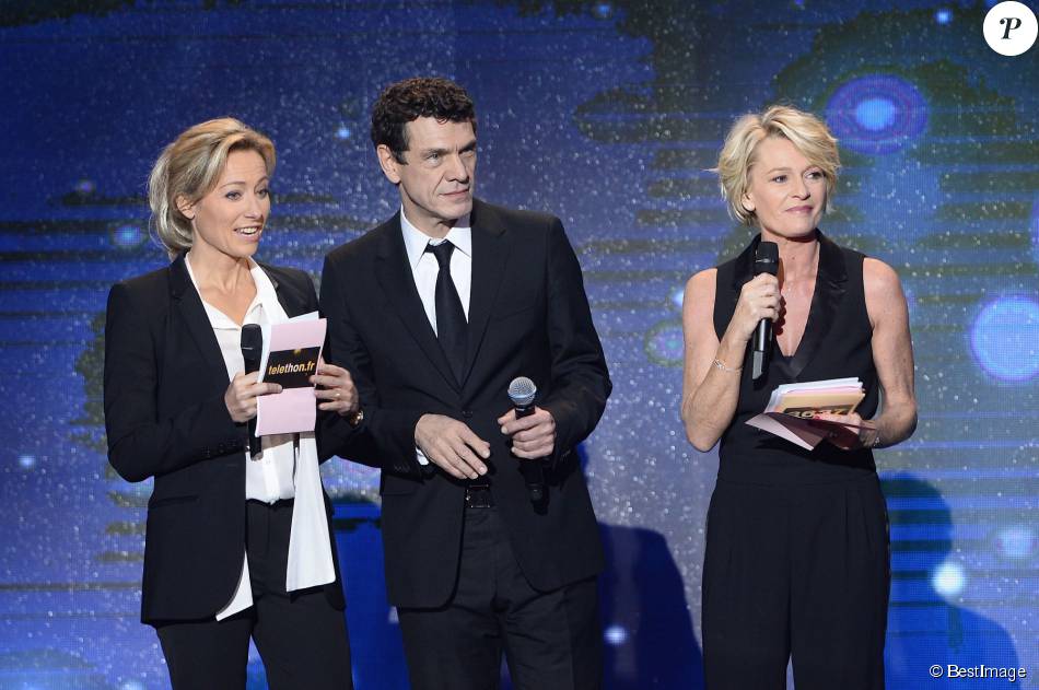 Anne-Sophie Lapix, Marc Lavoine et Sophie Davant, lors du 29e Téléthon ...