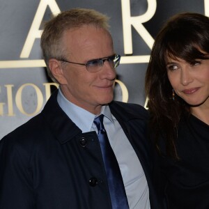 Sophie Marceau et son compagnon Christophe Lambert - Arrivee des people au defile Giorgio Armani Haute Couture Printemps/Ete 2014 au Palais de Tokyo a Paris, le 21 janvier 2014.