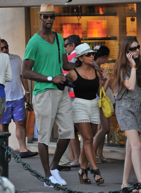 <p>Chris Bosh, star du Miami Heat, et sa femme Adrienne en juillet 2011 lors de vacances à Saint-Tropez.</p>