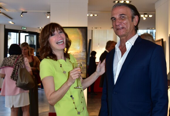 Alberto Bertti et Karen Cheryl (Isabelle Morizet) - Vernissage de l'exposition du peintre Alberto Bertti au 12 Drouot à Paris le 8 juin 2015.