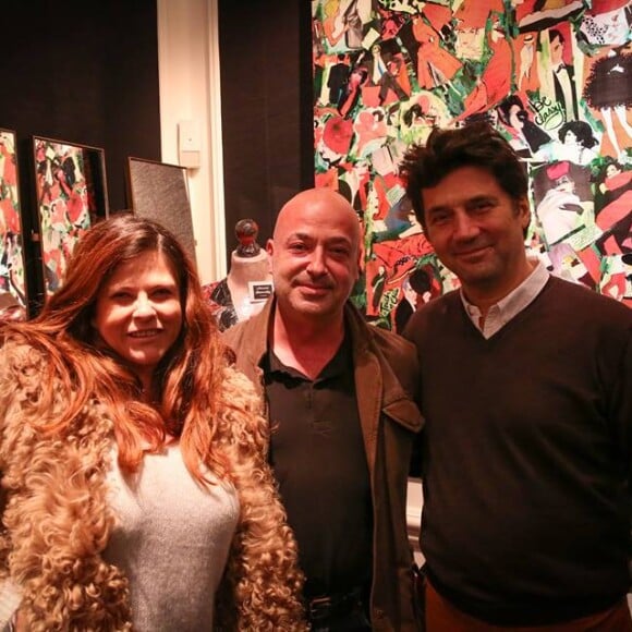 Charlotte Valandrey, Bruno Madinier et un ami, lors de la soirée de clôture de l'exposition d'Anne Mondy, Accords Croisés by Papertorn, au Dedar Showroom à Paris, en décembre 2015.