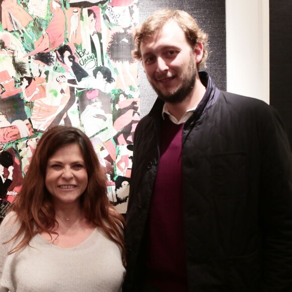 Charlotte Valandrey et Amaury Leveaux, lors de la soirée de clôture de l'exposition d'Anne Mondy, Accords Croisés by Papertorn, au Dedar Showroom à Paris, en décembre 2015.