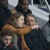 Pierre Sarkozy et Richard Anconina, dans les tribunes du Parc des Princes à Paris, lors du match PSG - Angers, dans le cadre de la 22e journée de Ligue 1, le 23 janvier 2016. ©Cyril Moreau