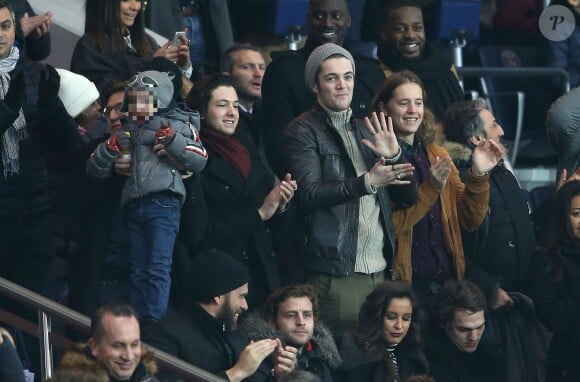 Jean Sarkozy et son fils Solal, Louis Sarkozy, Pierre Sarkozy et Richard Anconina, dans les tribunes du Parc des Princes à Paris, lors du match PSG - Angers, dans le cadre de la 22e journée de Ligue 1, le 23 janvier 2016. ©Cyril Moreau