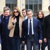 Nicolas Sarkozy et sa femme Carla Bruni-Sarkozy vont voter au lycée Jean de la Fontaine dans le 16e arrondissement de Paris pour le second tour des élections régionales, le 13 décembre 2015 © Pool