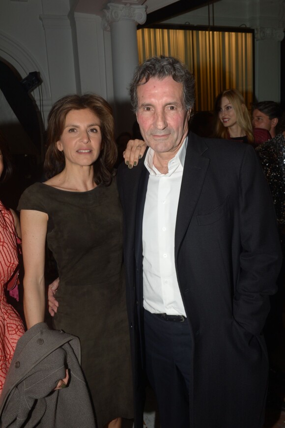 Jean-Jacques Bourdin et sa femme Anne Nivat à la soirée Néo Burlesque à l'hôtel Vernet à Paris le 20 mars 2014.