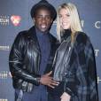 Rio Mavuba et son épouse Elodie enceinte - Avant-première du film "Chocolat" au Gaumont Champs-Elysées Marignan à Paris, le 1er février 2016.