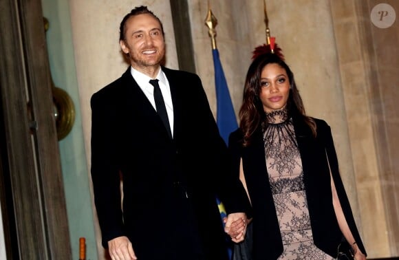 David Guetta et sa belle Jessica Ledon au dîner d'état donné en l'honneur du président cubain Raul Castro au palais de l'Elysée à Paris, le 1er février 2016. ©Dominique Jacovides/Bestimage