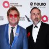 Elton John et son époux David Furnish lors de la soirée "Elton John AIDS Foundation Oscar Party" à West Hollywood, le 22 février 2015