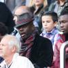 Lilian Thurama avex ses fils Kephren et Marcus lors de la rencontre entre le PSG et les Girondins de Bordeaux au Parc des Princes à Paris le 25 octobre 2014