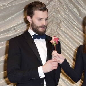 Jamie Dornan et Dakota Johnson (habillée en Dior) - Première du film "Cinquante Nuances de Grey" lors du 65e festival international du film de Berlin (Berlinale 2015), le 11 février 2015.1