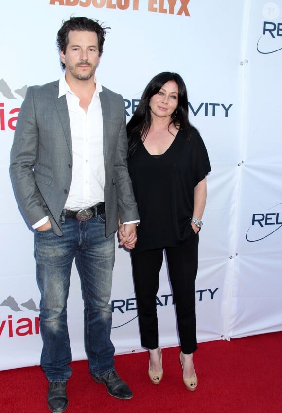 Shannen Doherty et son mari Kurt Iswarienko lors de la soirée "Pathway To The Cure : A fundraiser " à l'aéroport de Santa Monica, le 11 juin 2014