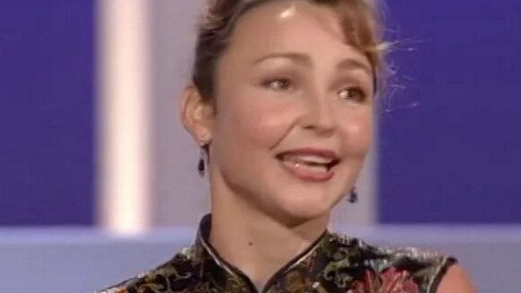 Catherine Frot recevant son César de meilleure actrice dans un second rôle pour Un air de famille, en 1997