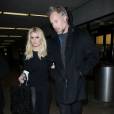 Jessica Simpson et son mari Eric Johnson à l'aéroport de Los Angeles le 13 janvier 2016.